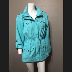 Mint colored windbreaker with collapsable hood